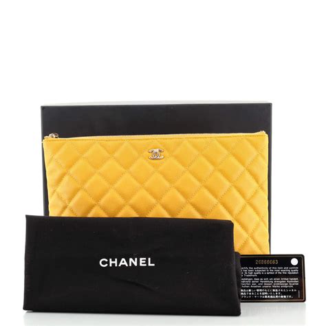 chanel o case clutch price|Chanel quilted bag.